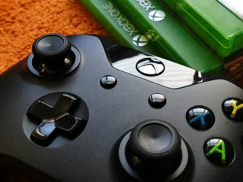 Console lounge with sofas and large screens